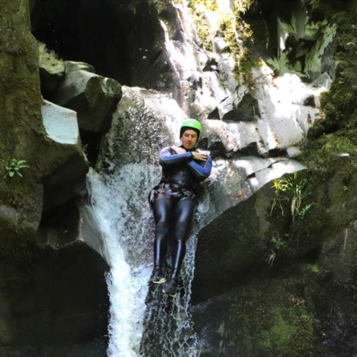 Canyon Scrambling in Scotland Sliding Down Rock